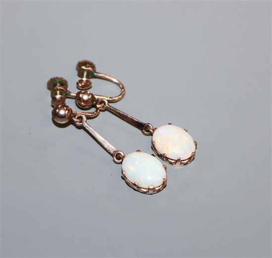 A pair of early 20th century yellow metal and white opal set drop ear clips, 34mm.